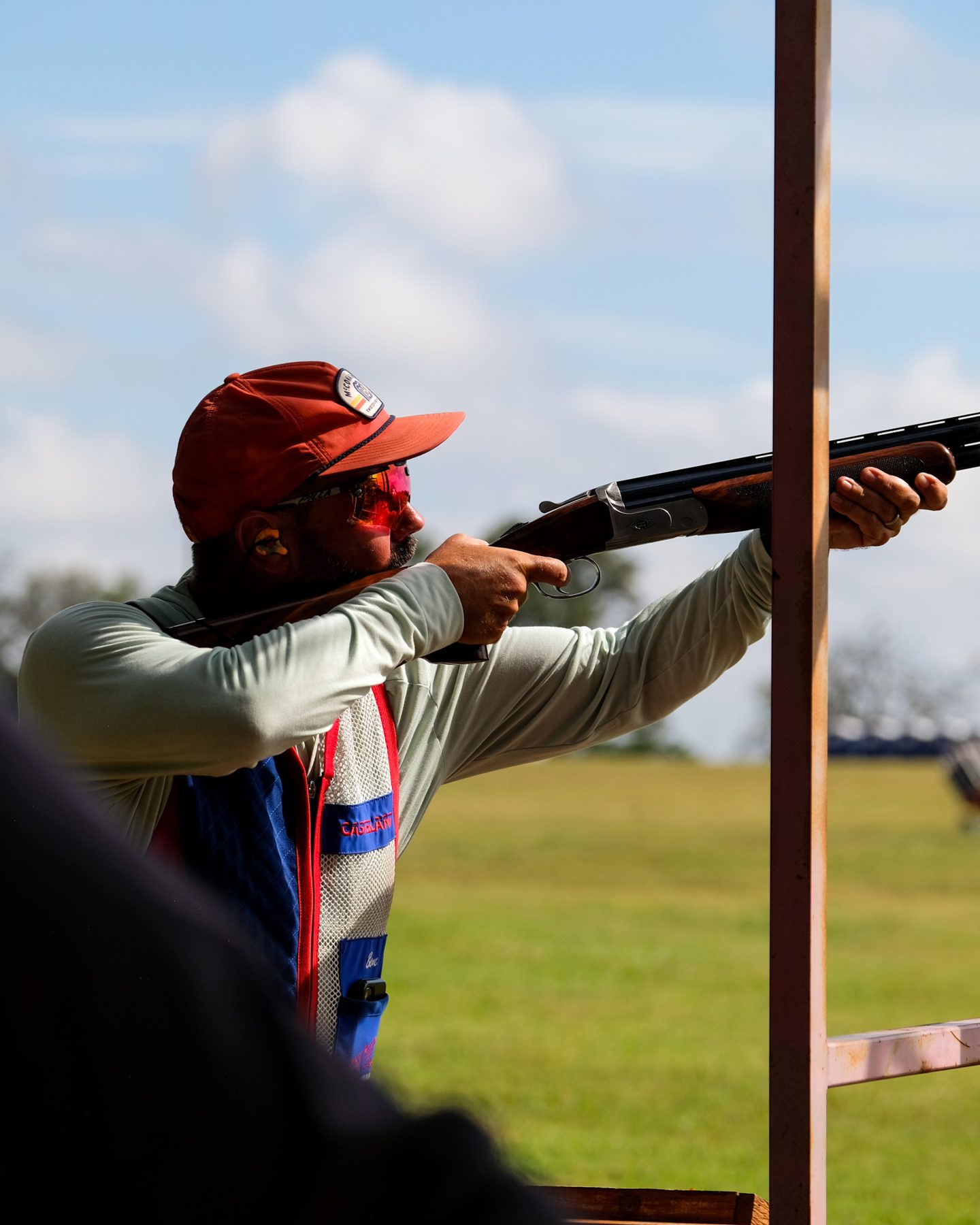 A member shooting shotgun at Hog Heaven